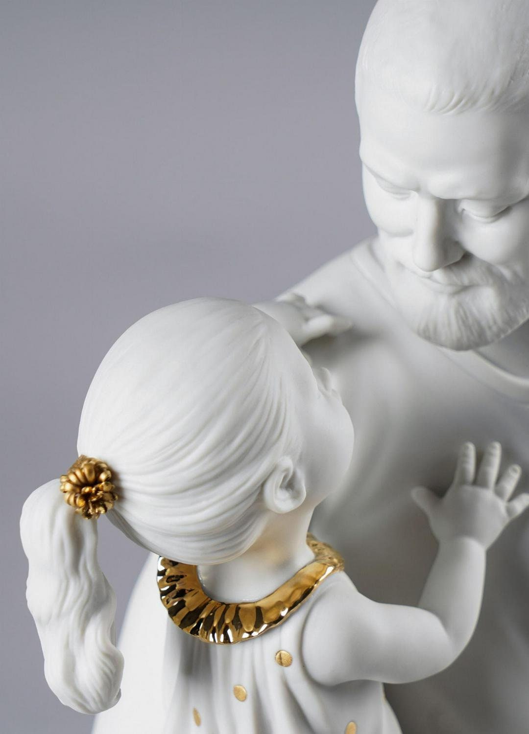 In daddy's arms figurine. golden luster and white porcelain sculpture by lladro home decor birthday gift