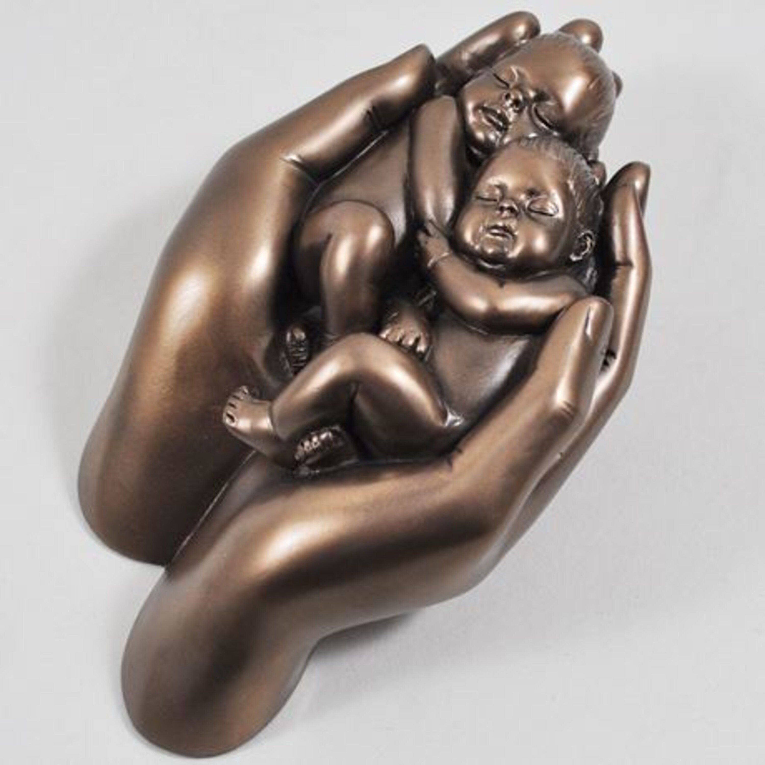 Babies in Hand Cold Cast Bronze Sculpture by Love is Blue